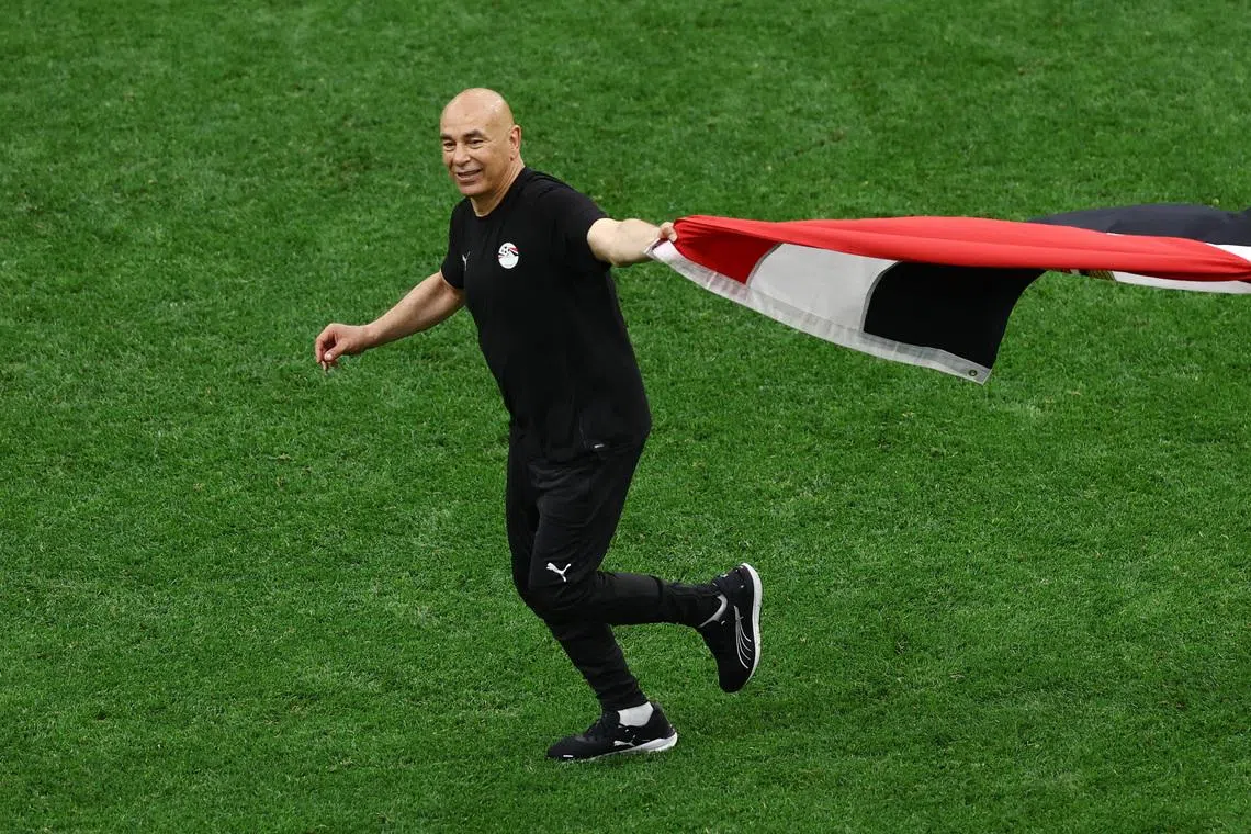 Egypt coach Hossam Hassan celebrates his side's 3-1 comeback win over New Zealand.