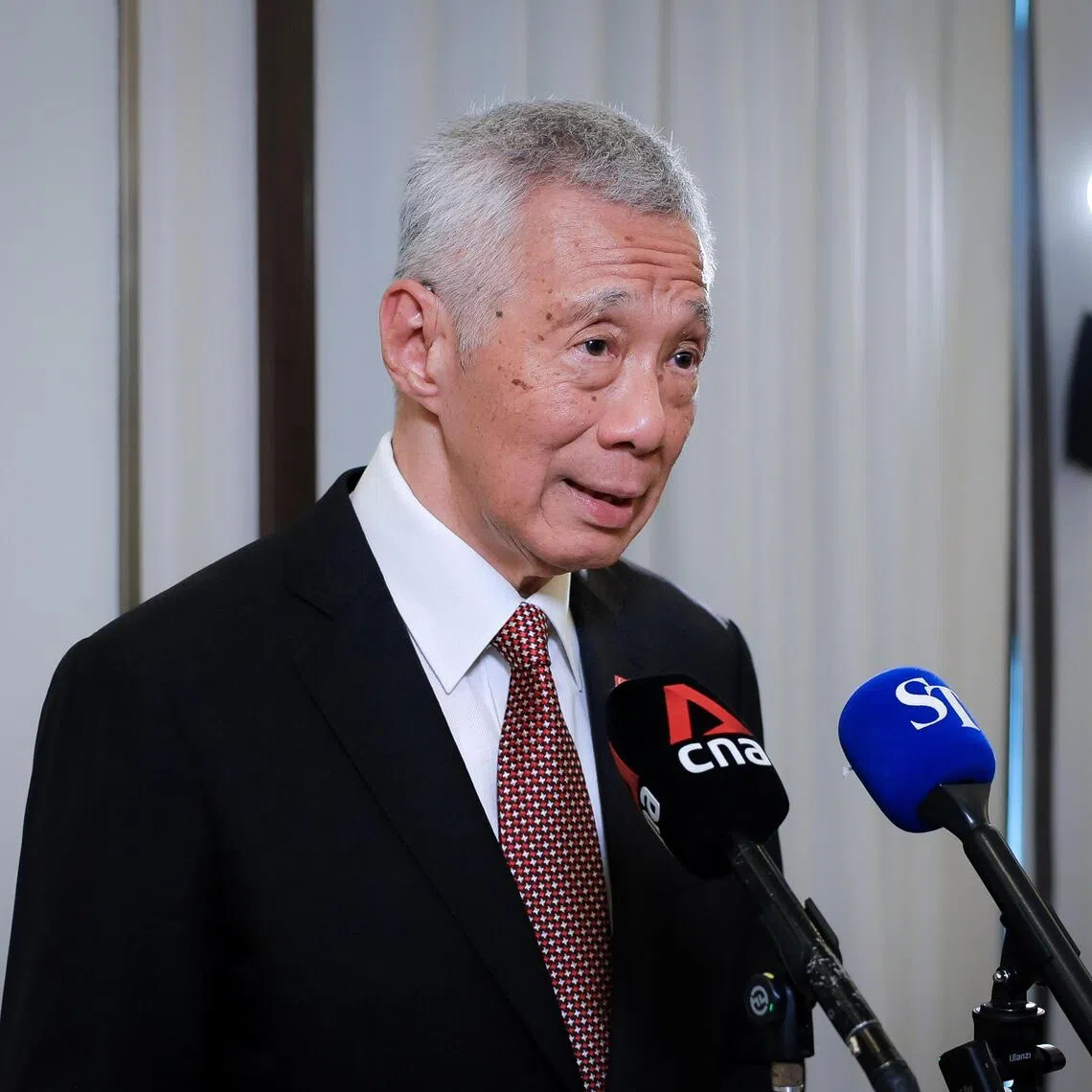 Senior Minister Lee Hsien Loong speaking during a wrap-up interview with Singapore media in Astana on Aug 27, at the end of his official visit to Kazakhstan.