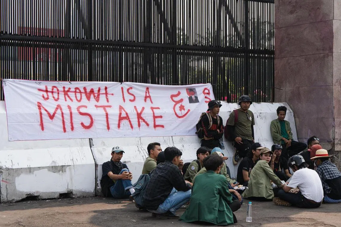 Students from Djuanda University sitting outside Indonesia's Parliament building on August 23, having commuted for about 90 minutes from the West Java city to make their voices heard.