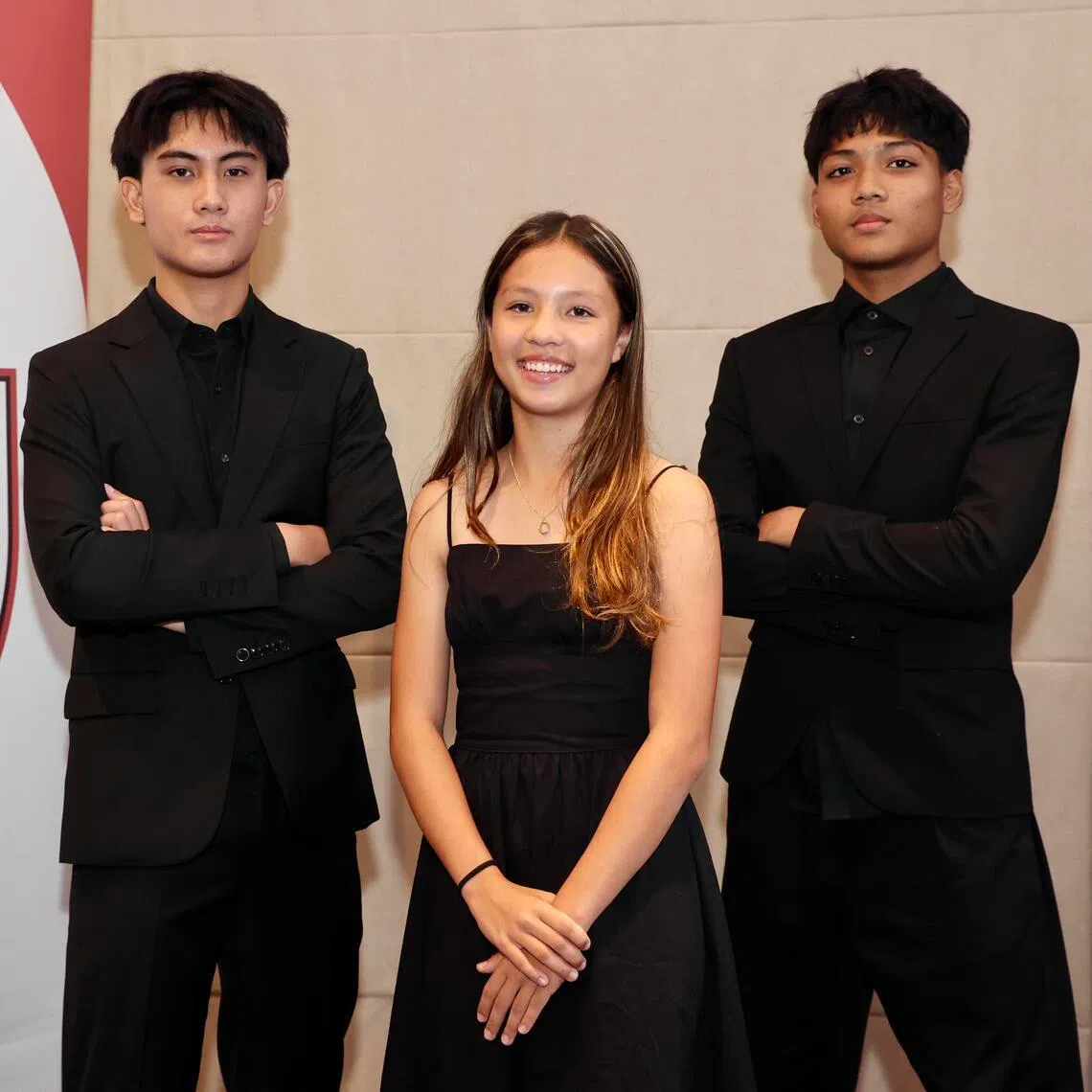 (From left) Matteo del Rosario, Aria Julie Romano and Ayden Naim Fakhry Fazrul Nawaz, who are the Unleash the Roar! overseas scholarship recipients for 2026, at the UTR Pathways and Appreciation Ceremony held at the Asian Civilisations Museum on July 26.