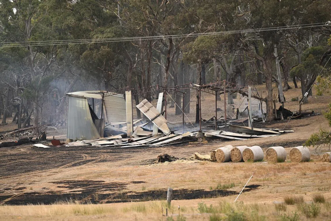 A burnt shed is seen near Beaufort in Victoria, Australia on Feb 23, 2024. More than 1000 firefighters are working to contain a large bushfire raging in western Victoria as hot conditions set in.  