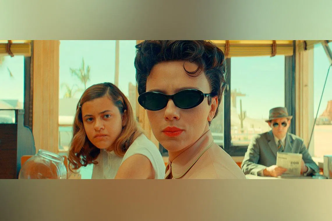 (From left) Grace Edwards as Dinah, Scarlett Johansson as Midge Campbell and Damien Bonnaro as Bodyguard/Driver in Asteroid City.