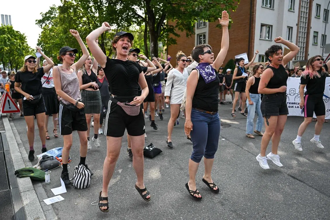 Members of a Swiss women's rights group demonstrate prior to a Rammstein concert in Bern.