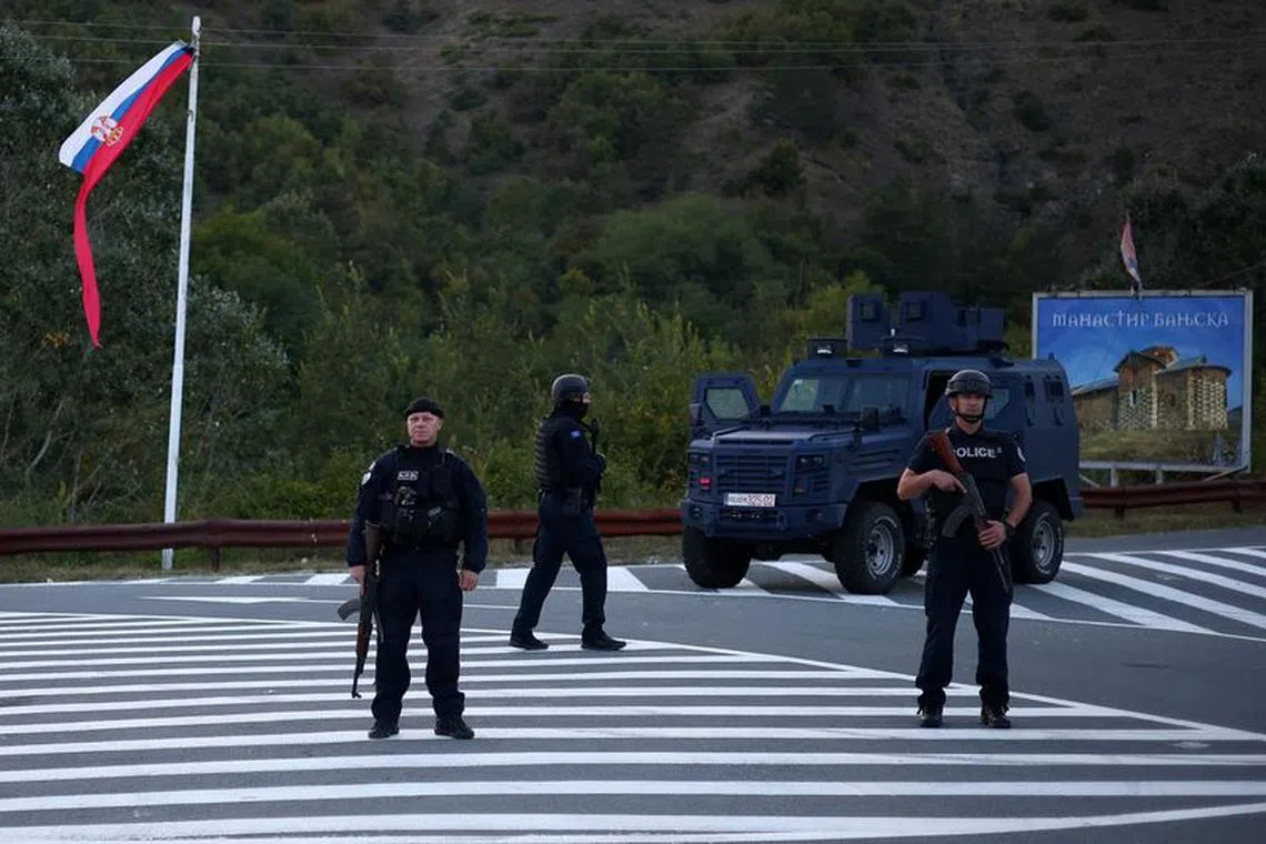 Kosovo special police officers patrol a road to Banjska monastery, in the aftermath of a shooting incident, near Zvecan, Kosovo September 26, 2023. REUTERS/Florion Goga/File Photo