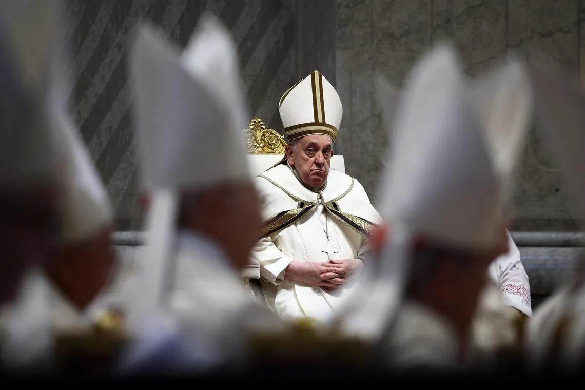 Pope Francis attends the Chrism Mass in St. Peter's Basilica at the Vatican, March 28, 2024. REUTERS/Guglielmo Mangiapane