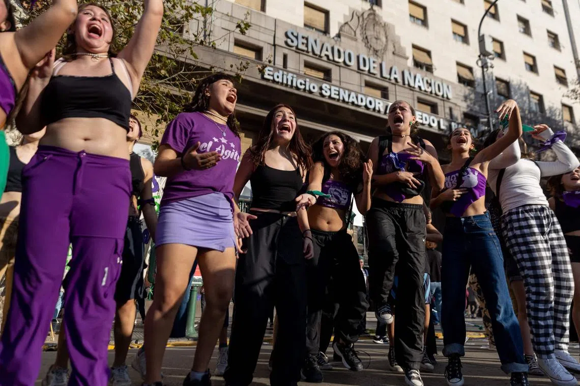 Women's rights activists take part in a demonstration against gender violence in Buenos Aires, Argentina.