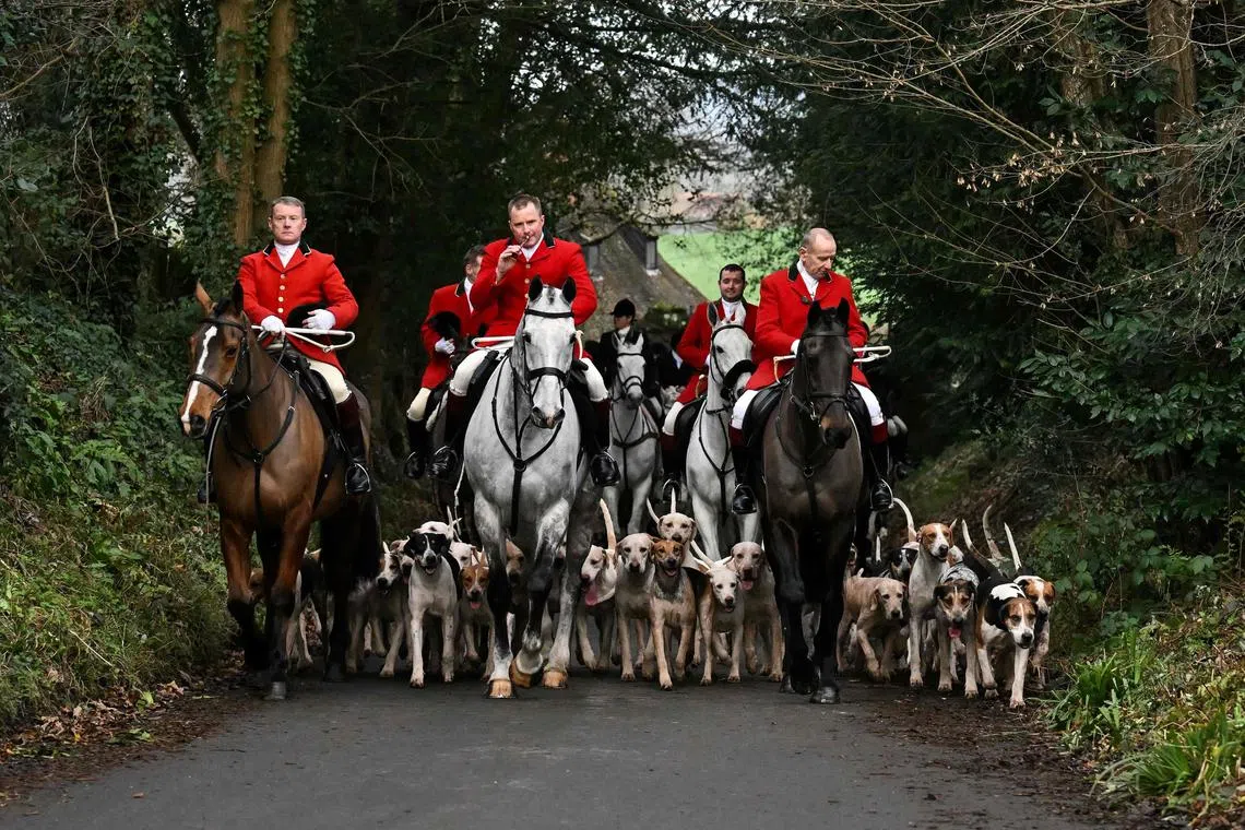 Members of the Old Surrey, Burstow and West Kent Hunt arriving to gather at Chiddingstone Castle for their annual Boxing Day hunt, south of London on Dec 26, 2023. 