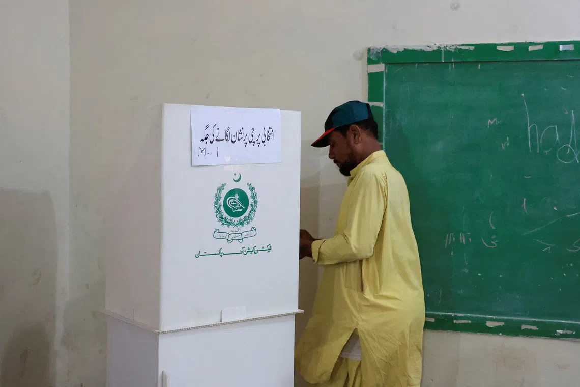 A man votes during the second phase of the Azad Jammu and Kashmir (AJK) Legislative Assembly elections at a polling station in Karachi, Pakistan, August 2, 2026. REUTERS/Akhtar Soomro