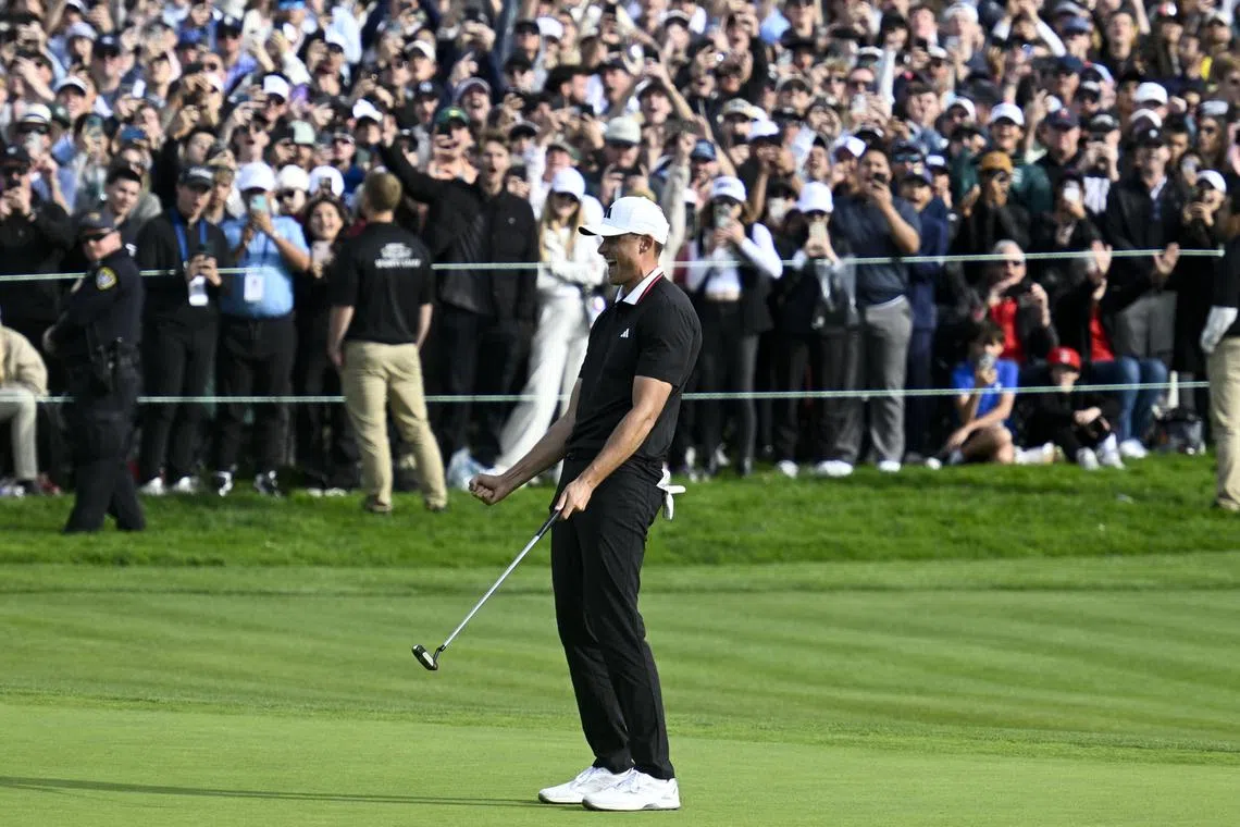Ludvig Aberg celebrating after winning The Genesis Invitational golf tournament at Torrey Pines on Feb 16 in San Diego, California.
