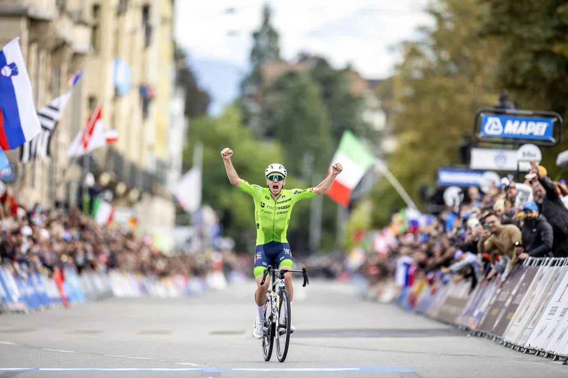 Tadej Pogacar of Slovenia celebrates after winning the men's elite road race at the 2024 UCI Road World Championships in Zurich, Switzerland, on Sept 29.