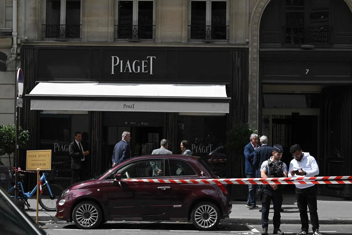 TOPSHOT - Red and white police tape cordons off the entrance of the French luxury Piaget jewellers store at Rue de la Paix that leads to Place Vendome, in Paris on August 1, 2023, following a robbery with losses estimated at €10-15 million according to the public prosecutor. (Photo by STEFANO RELLANDINI / AFP)