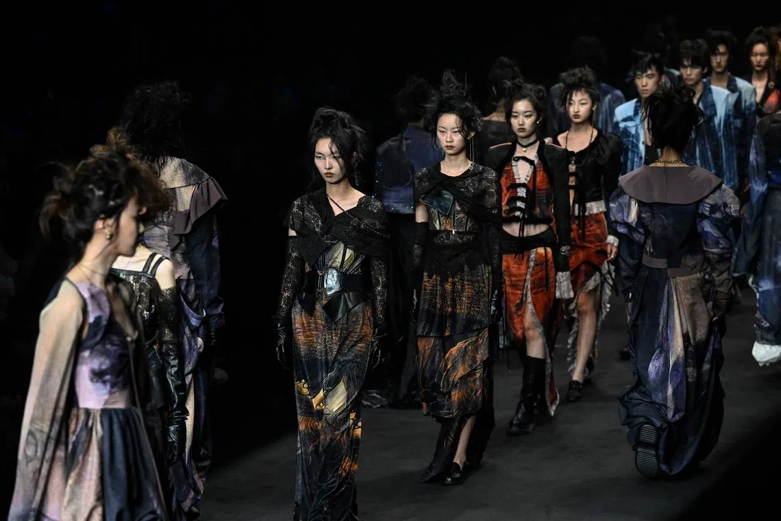 Models displaying creations from Lacrimatory by designer Wang Yiqin on Sept 8.