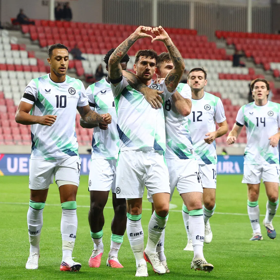 Soccer Football - Nations League - Group B3 - Israel v Republic of Ireland - Nagyerdei Stadion, Debrecen, Hungary - September 27, 2026 Republic of Ireland's Troy Parrott celebrates scoring their first goal with teammates REUTERS/Bernadett Szabo