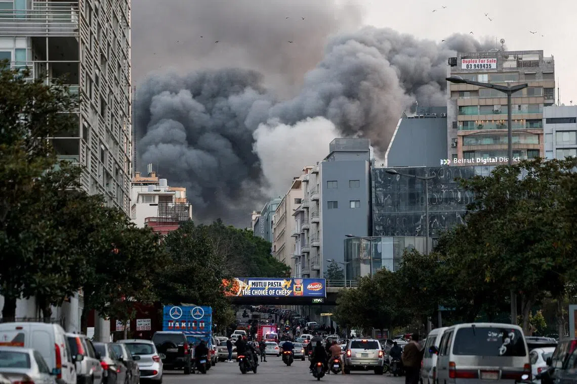 Smoke rises after an Israeli strike in central Beirut's Bachoura neighbourhood.