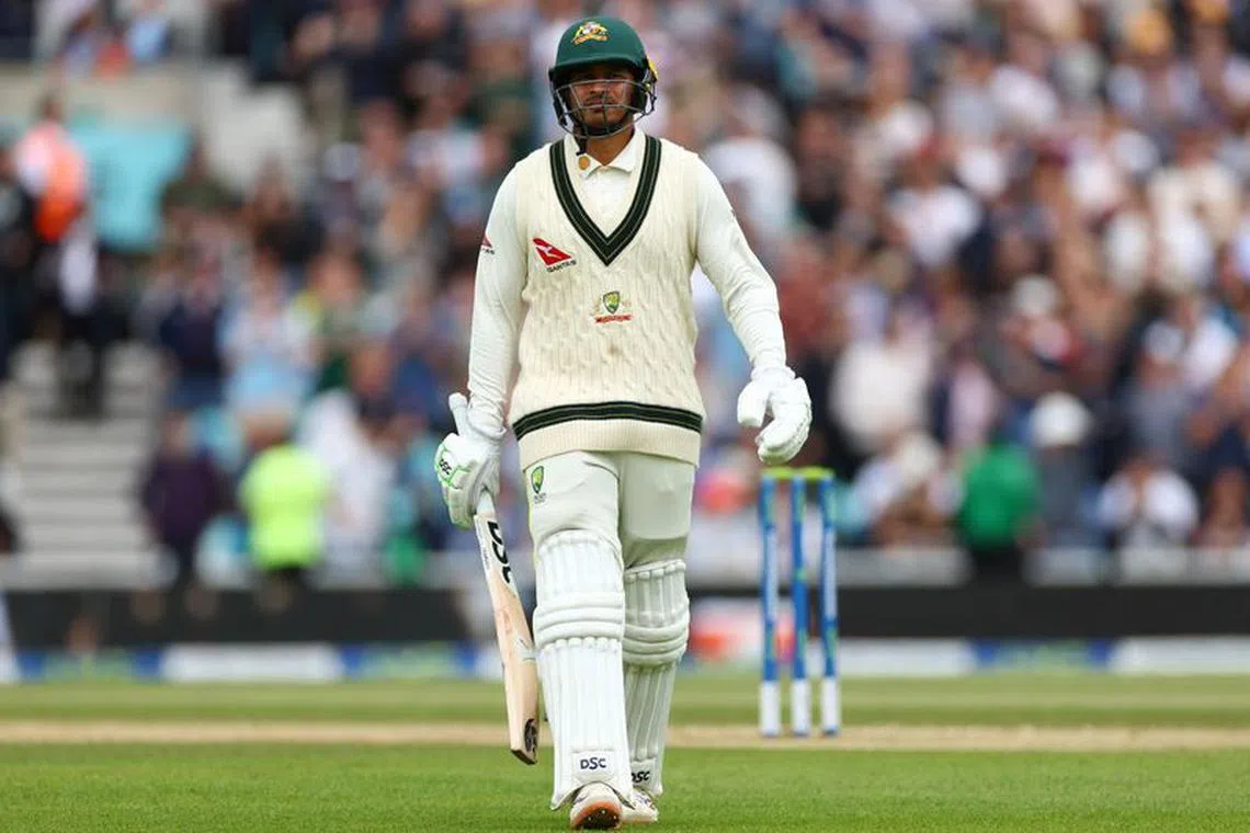 FILE PHOTO: Cricket - Ashes - Fifth Test - England v Australia - The Oval, London, Britain - July 31, 2023 Australia's Usman Khawaja walks after losing his wicket, lbw bowled by England's Chris Woakes Action Images via Reuters/Andrew Boyers/File Photo