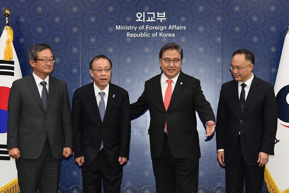 South Korean Foreign Minister Park Jin welcomes Senior Deputy Minister for Foreign Affairs of Japan Takehiro Funakoshi, Assistant Minister of Foreign Affairs of China Nong Rong and Deputy Minister for Political Affairs of the South Korean foreign ministry Jung Byung-won before their meeting ahead of South Korea, China and Japan trilateral meeting at the foreign ministry, on September 25, 2023, in Seoul, South Korea. Kim Min-Hee/Pool via REUTERS