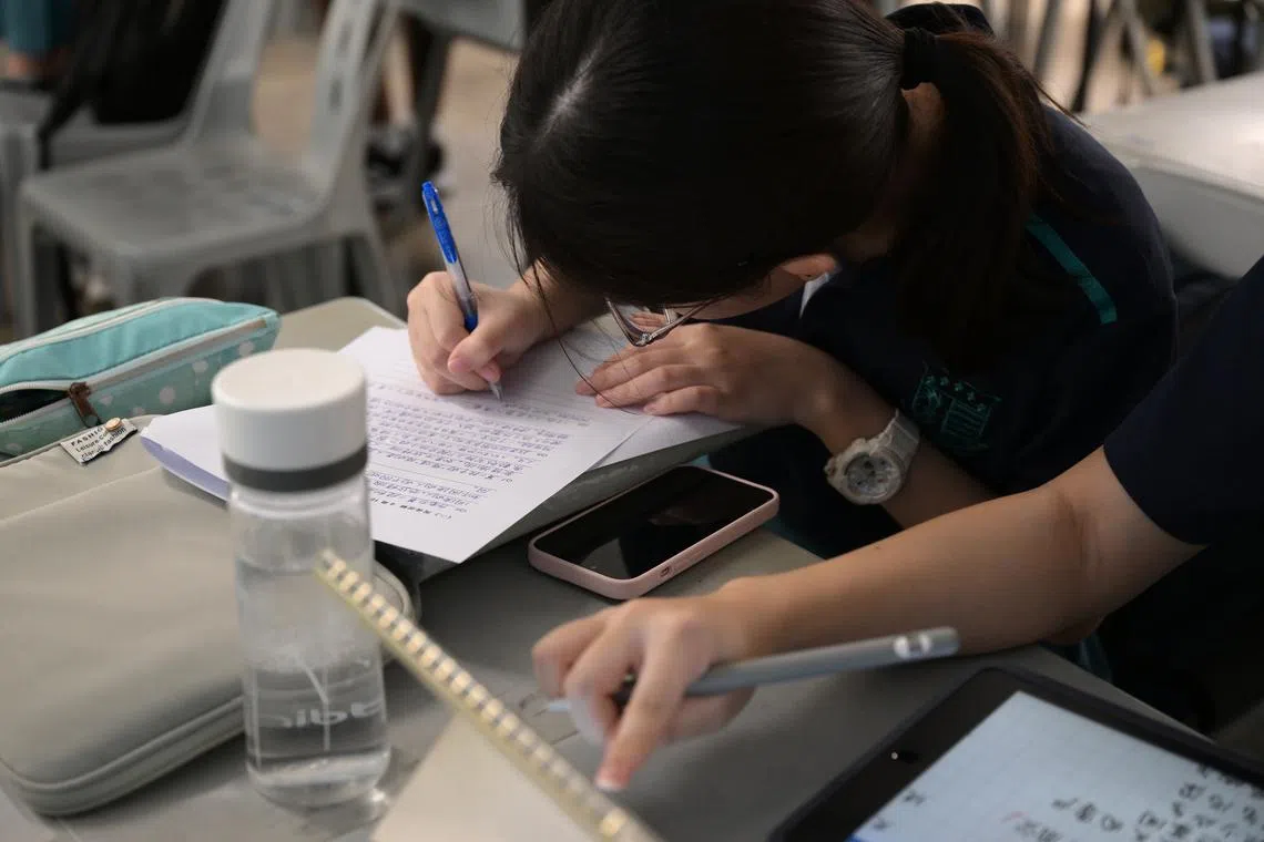 Educational reforms have made exams less stressful, but it's still hard for parents to let go.