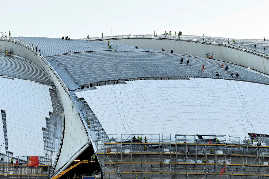 Workers carry out construction work at Aramco Stadium, one of the main stadiums set to host the 2027 AFC Asian Cup, in Khobar, Saudi Arabia, July 9, 2026. Picture taken with a mobile phone. REUTERS/Hamad I Mohammed