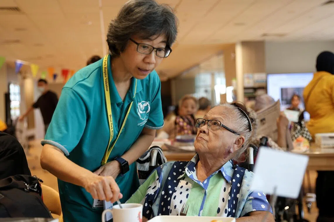 Volunteers at Dover Park Hospice’s day care prepare kopi for patients to evoke a coffee-shop vibe.
