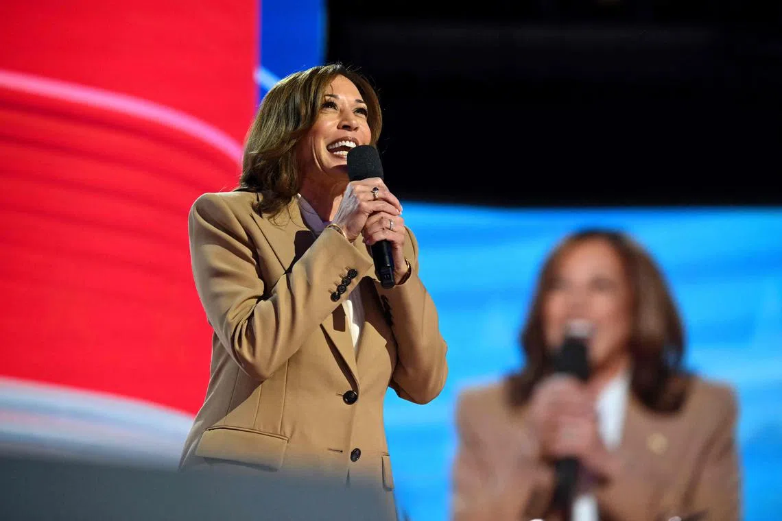 TOPSHOT - US Vice President and 2024 Democratic presidential candidate Kamala Harris speaks on the first day of the Democratic National Convention (DNC) at the United Center in Chicago, Illinois, on August 19, 2024. Vice President Kamala Harris will formally accept the party’s nomination for president at the DNC which runs from August 19-22 in Chicago. (Photo by ANDREW CABALLERO-REYNOLDS / AFP)