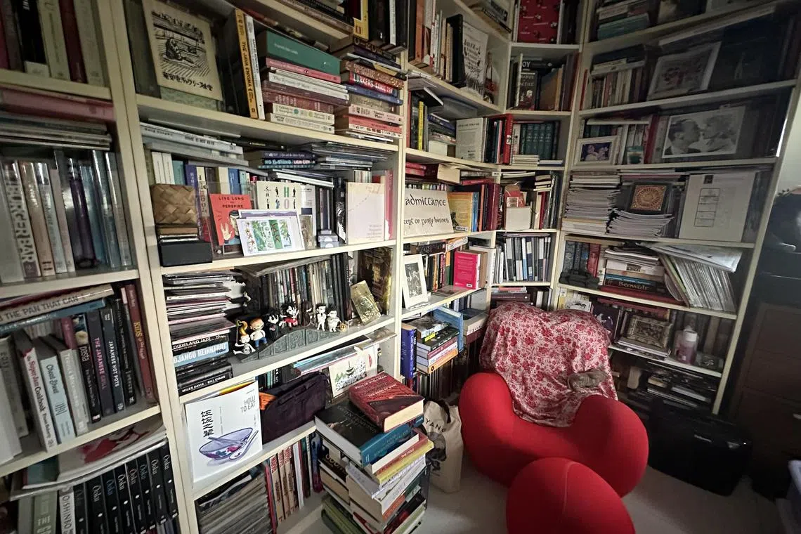  After five hours of weeding and reshelving, two tottering piles of books remain on the floor of my study. 