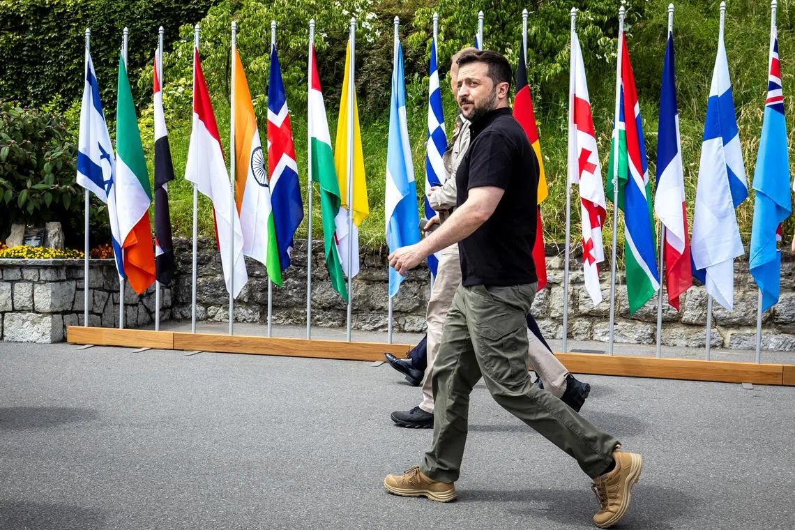 FILE PHOTO: Ukrainian President Volodymyr Zelenskiy walks during the Summit on Peace in Ukraine, in Stansstad, Switzerland, June 16, 2024. MICHAEL BUHOLZER/Pool via REUTERS/File Photo