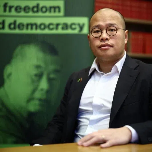 Mr Sebastien Lai Sung-yan, son of jailed Hong Kong media mogul Jimmy Lai, poses for a photograph after a press conference in London on Dec 15.