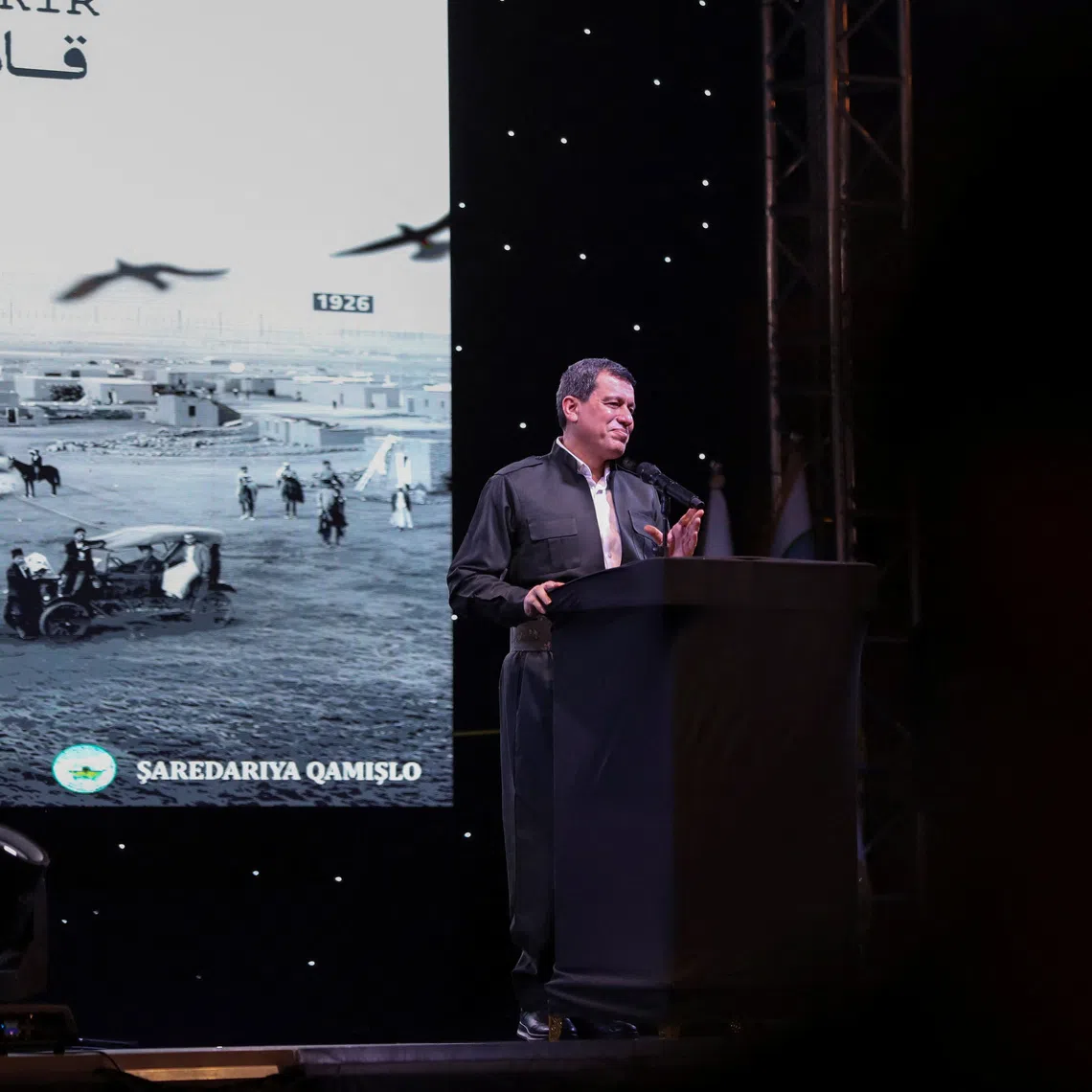 SDF commander Mazloum Abdi delivers a speech during a celebration marking the centenary of the city of Qamishli, Syria, August 20, 2026. REUTERS/Orhan Qereman