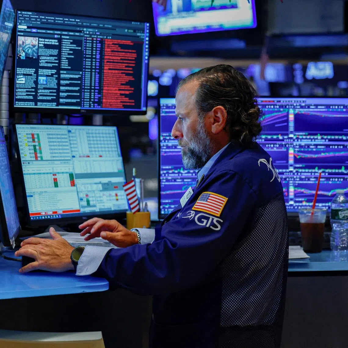 A trader works on the floor of the New York Stock Exchange (NYSE) in New York City, U.S., August 4, 2026. REUTERS/Jeenah Moon