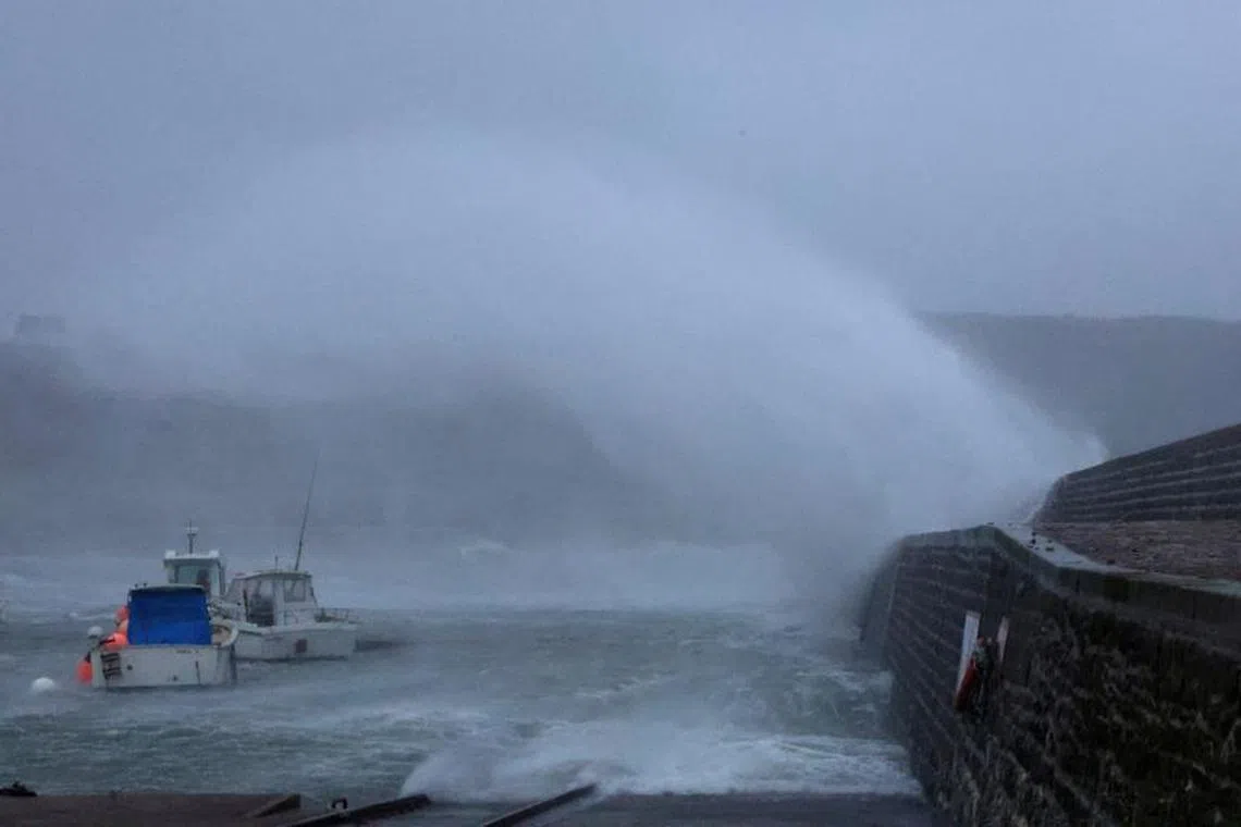 Waves crash against the breakwater of the port during Storm Ciaran at Goury near Cherbourg, Normandy, France, November 2, 2023.  REUTERS/Pascal Rossignol