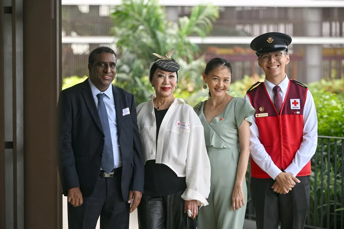 (From left) Mr Satyanarayana Mylavarapu, 50, Mrs?Genevieve Peggy Jeffs?(declined to reveal age), Ms?Han Bi Guang, 51 and Mr?Goh Jia Yong, 23, at HomeTeamNS Bedok Reservoir Clubhouse, on Sep 2, 2024. / The Singapore Red Cross (SRC) 75th Anniversary at HomeTeamNS Bedok Reservoir Clubhouse, on Sep 2, 2024.