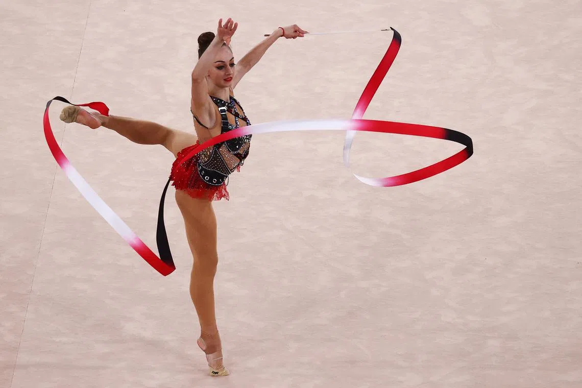 Tokyo 2020 Olympics - Gymnastics - Rhythmic - Individual All-Around - Final - Rotation 4 - Ariake Gymnastics Centre, Tokyo, Japan - August 7, 2021. Boryana Kaleyn of Bulgaria in action with ribbon REUTERS/Lindsey Wasson/File Photo