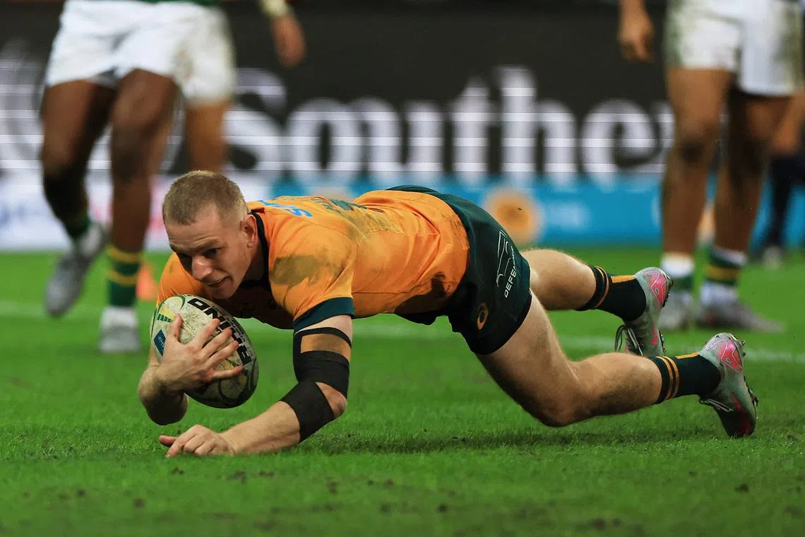 FILE PHOTO: Rugby Union - Rugby Championship - South Africa v Australia - DHL Stadium, Cape Town, South Africa - August 23, 2025  Australia's Max Jorgensen scores a try REUTERS/Esa Alexander/ File Photo