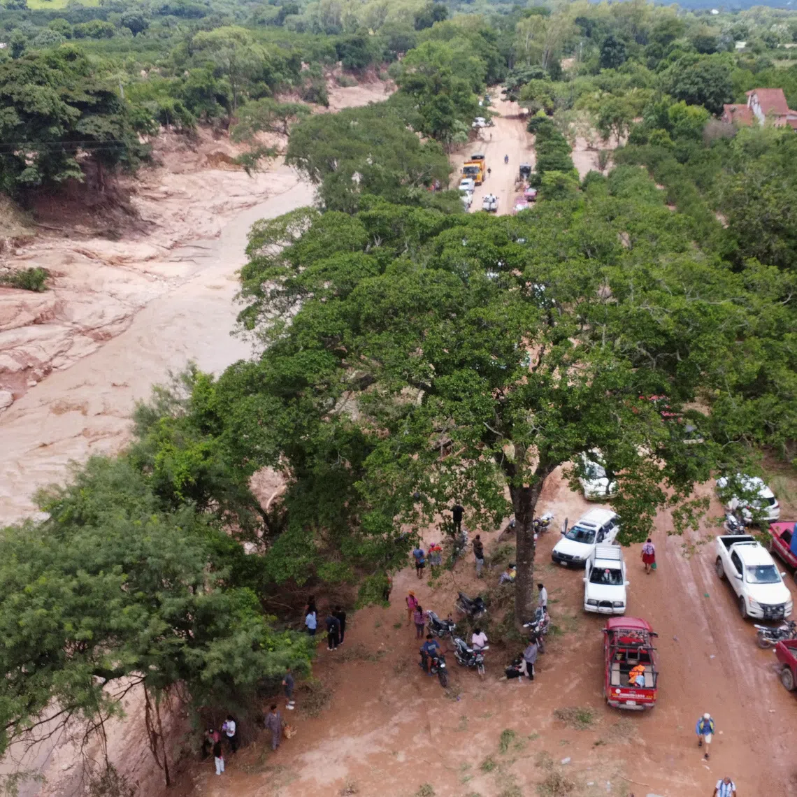 A drone view shows flooded areas that left communities isolated after torrential rain in the community of El Torno, in Santa Cruz region, Bolivia, December 14, 2025. REUTERS/Ipa Ibanez