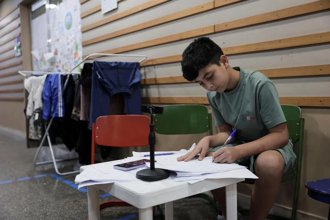 Beirut school converted to wartime shelter becomes flashpoint for societal tensions