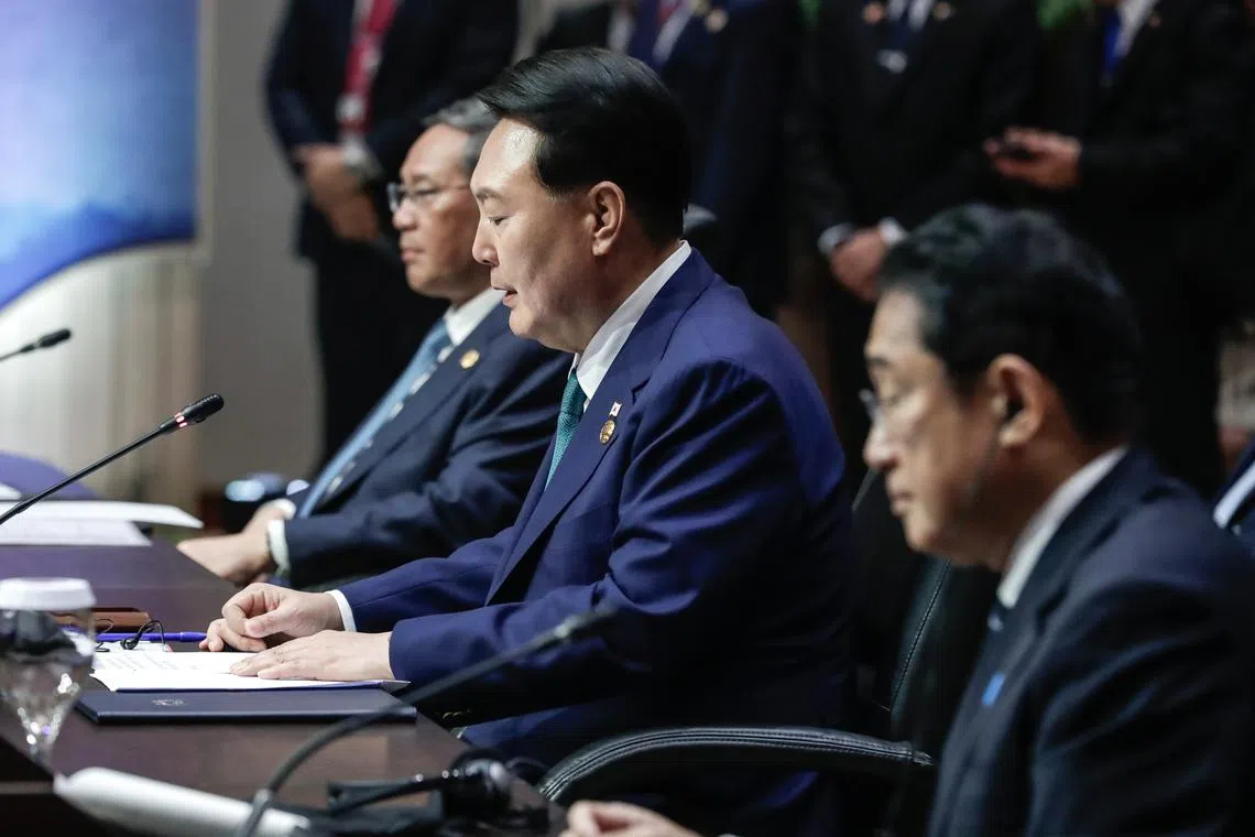 (From left) Chinese Premier Li Qiang, South Korean President Yoon Suk Yeol and Japanese Prime Minister Fumio Kishida at the Asean leaders’ summit in Jakarta, on Sept 6. 