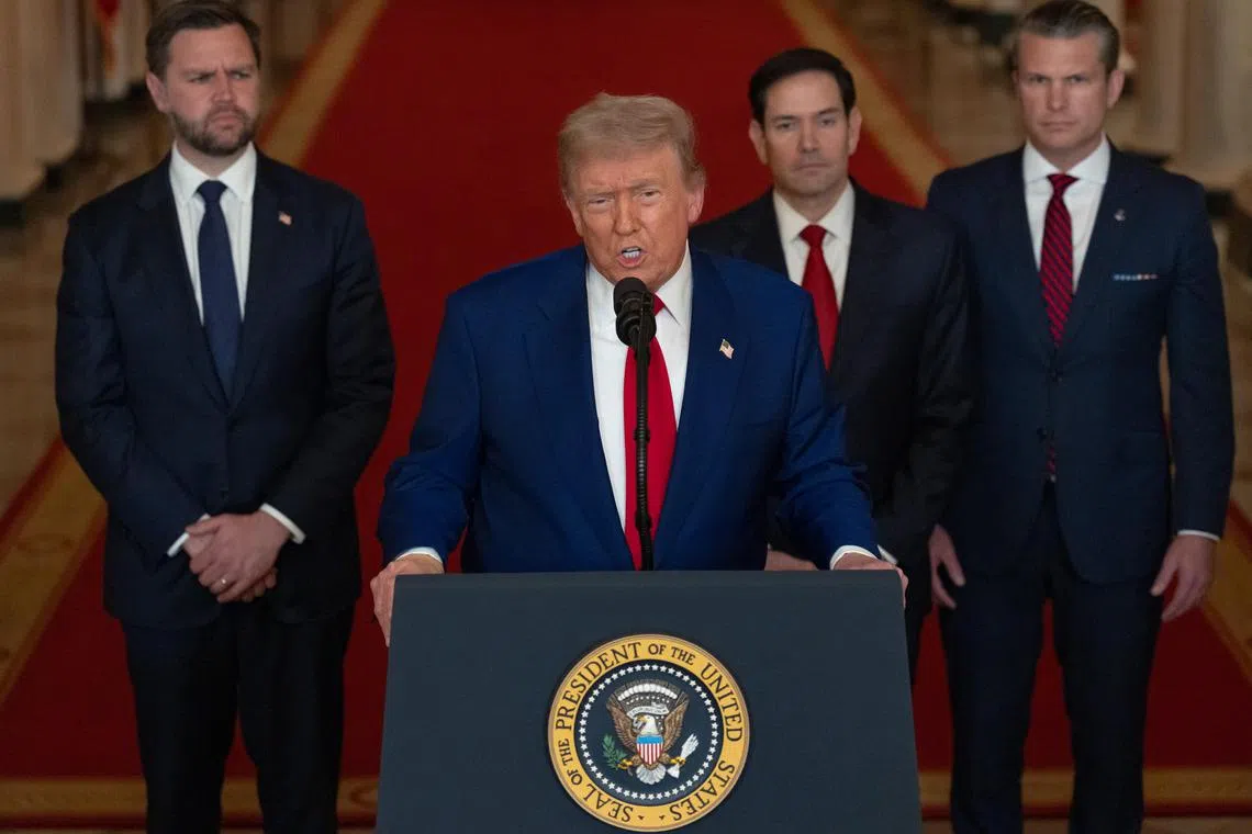 US President Donald Trump (at lectern) with US Secretary of Defence Pete Hegseth (right), US Vice-President JD Vance (left) and US Secretary of State Marco Rubio (second from right) as he delivers an address to the nation following US strikes on Iran's nuclear facilities on June 21.