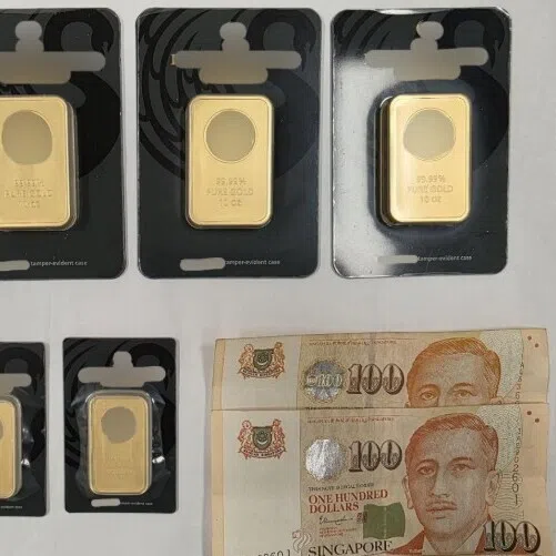Police seized gold bars worth about $200,000 from the woman.