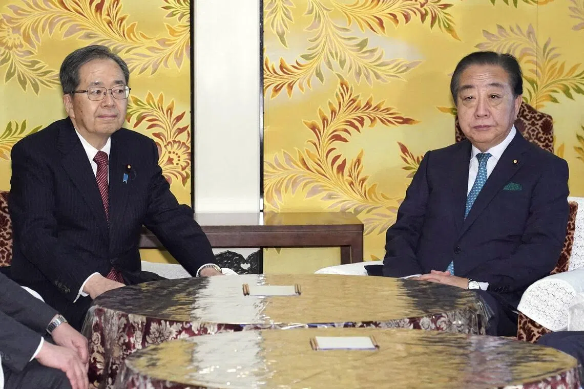 Leader of the Constitutional Democratic Party of Japan (CDP) Yoshihiko Noda (right) and Komeito leader Tetsuo Saito attend a meeting in Tokyo on Jan 15, 2026. 