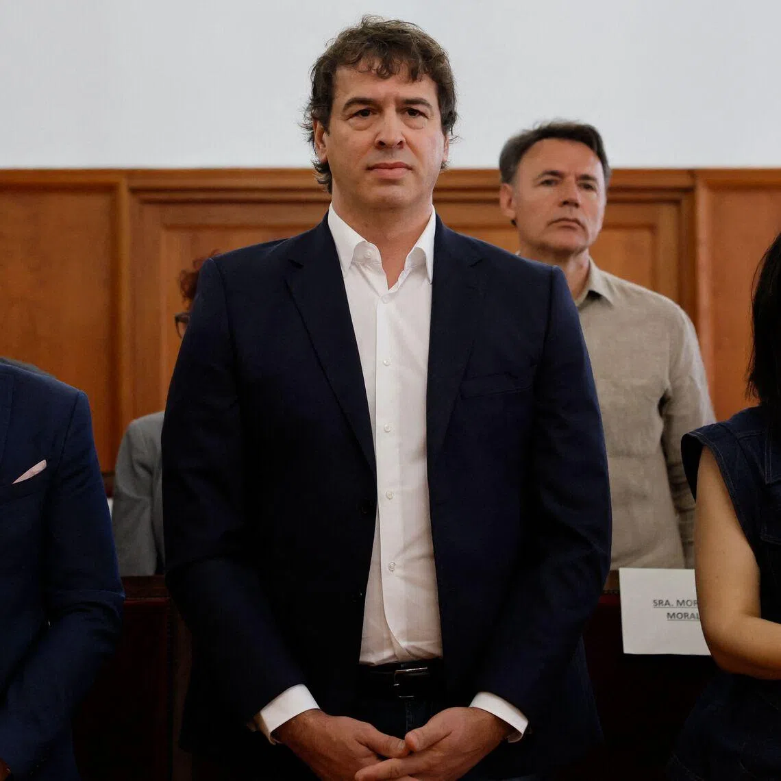 David Sanchez (centre) was accused of benefiting from an appointment tailored to him because of his family connection to the prime minister.