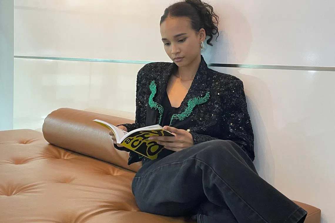 Iman Fandi loves reading in the space and comfort of her own home. 