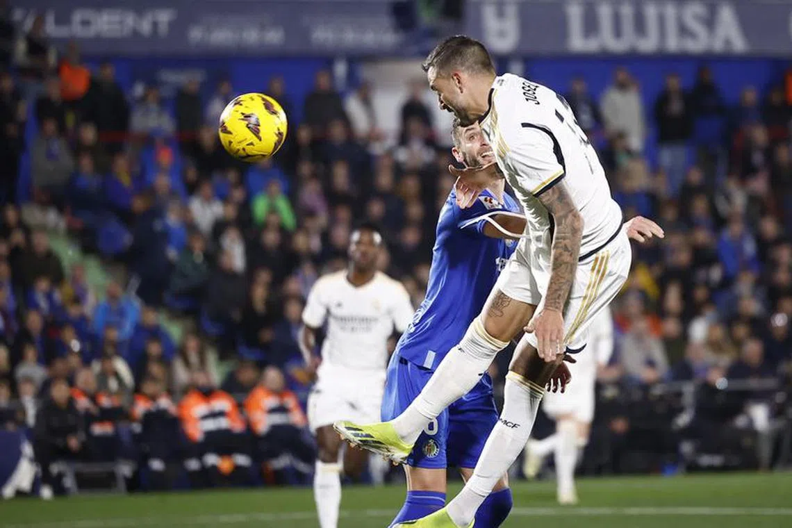 Soccer Football - LaLiga - Getafe v Real Madrid - Coliseum Alfonso Perez, Getafe, Spain - February 1, 2024 Real Madrid's Joselu scores their first goal REUTERS/Juan Medina