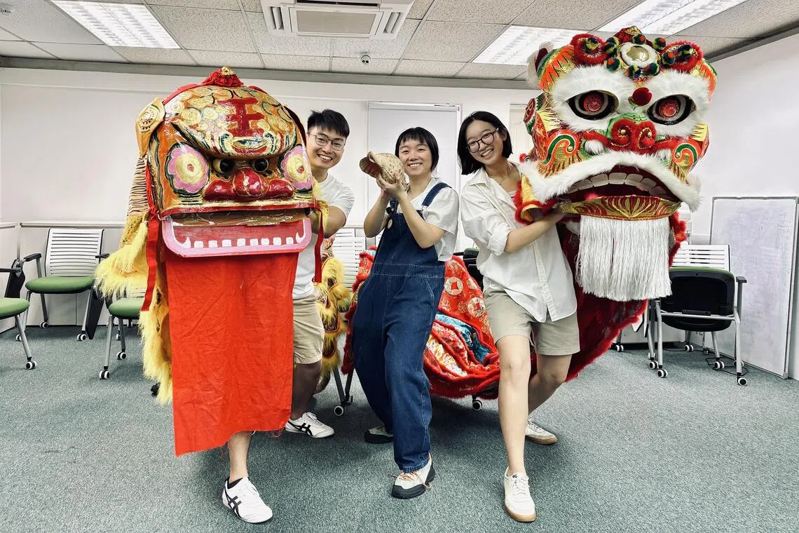 ecfun13 - The Hainanese Cooked members (from left) Ng Wee Liang, Yong Chuen Shin and Koh V-Nying hope their project will spark curiosity about Hainanese culture.
PHOTO: NUS LIBRARIES