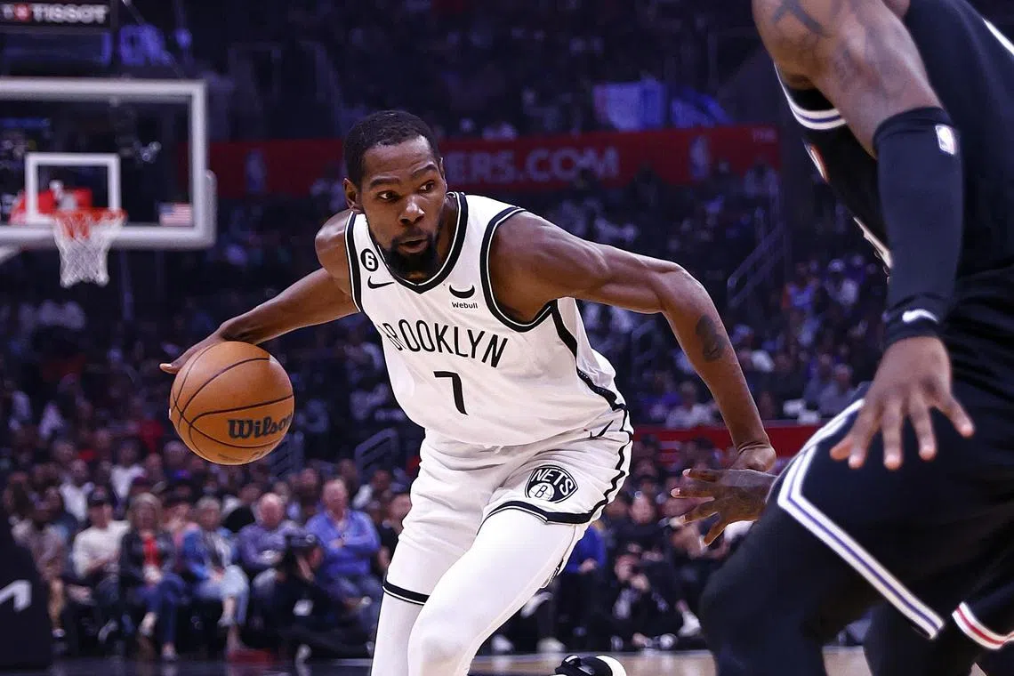 Kevin Durant of the Brooklyn Nets controls the ball against the Los Angeles Clippers in the first half at Crypto.com Arena on Nov 12, 2022.