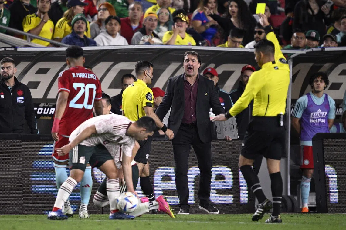 Dec 16, 2023; Los Angeles, CA, USA; Colombia head coach Nestor Lorenzo (center) reacts during the second half against Mexico at Los Angeles Memorial Coliseum. Mandatory Credit: Orlando Ramirez-USA TODAY Sports