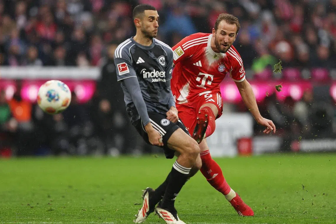 Soccer Football - Bundesliga - Bayern Munich v Eintracht Frankfurt - Allianz Arena, Munich, Germany - February 21, 2026 Bayern Munich's Harry Kane scores their third goal REUTERS/Maryam Majd