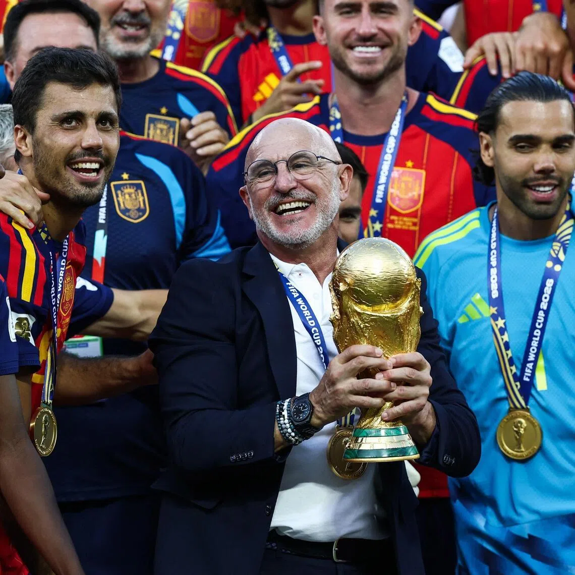 Spain’s head coach Luis de la Fuente holding the trophy after winning the 2026 World Cup final. The world champions are set to host the 2030 Cup.