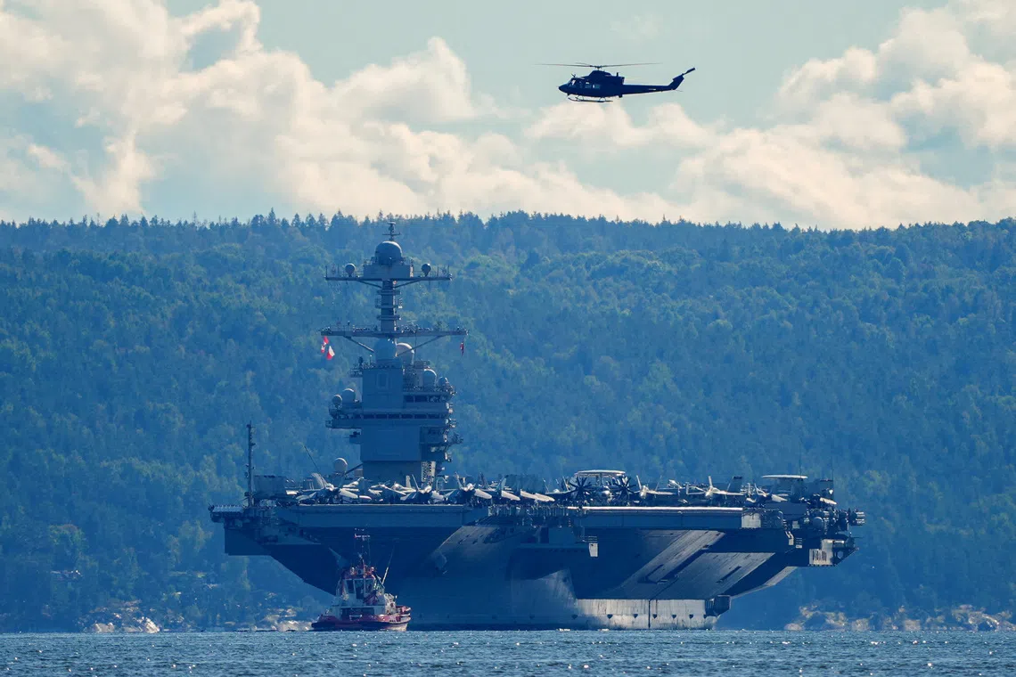FILE PHOTO: The world's largest warship, U.S. aircraft carrier USS Gerald R. Ford is seen in this file photo, on its way out of the Oslofjord at Nesodden and Bygdoy, Norway, September 17, 2025. NTB/Lise Aserud via REUTERS/File Photo