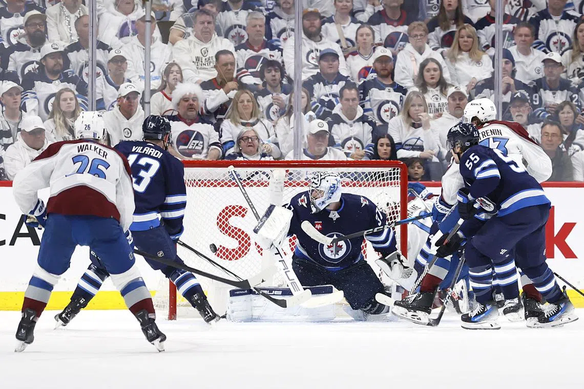 FILE PHOTO: Apr 30, 2024; Winnipeg, Manitoba, CAN; Colorado Avalanche center Yakov Trenin (73) scores on Winnipeg Jets goaltender Connor Hellebuyck (37) in the second period in game five of the first round of the 2024 Stanley Cup Playoffs at Canada Life Centre. Mandatory Credit: James Carey Lauder-USA TODAY Sports/File Photo