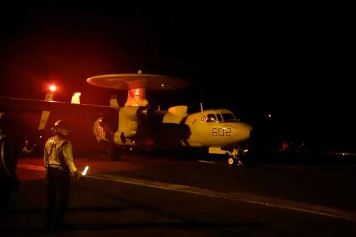 An aircraft takes off to join the U.S.-led coalition operation against military targets in Yemen, aimed at the Iran-backed Houthi militia that has been targeting international shipping in the Red Sea, from an undisclosed location, in this screengrab from a handout video released on January 12, 2024. US Central Command via X/Handout via REUTERS